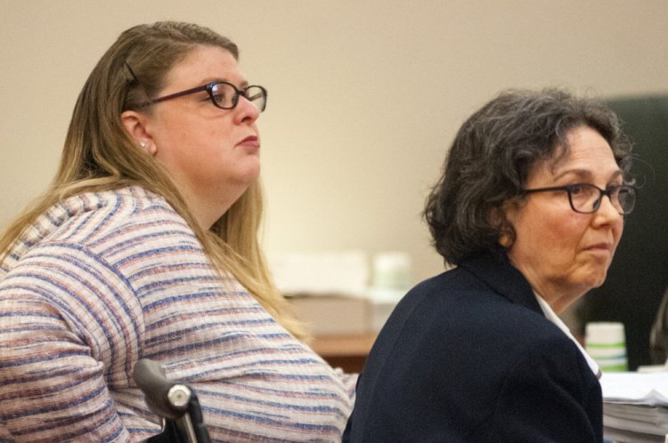 Sarah Conway, left, sits with her attorney, Sherry Tash, at the Capital Judicial Center in Augusta on the opening day of her trial Tuesday on a charge of gross sexual assault on a child. On Wednesday, a jury convicted Conway of the charge.
