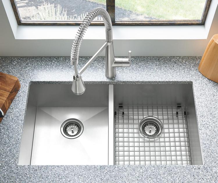 Showcasing sleek, geometric styling and impressive functionality, the Edgewater semi-pro kitchen faucet with single-handle operation.