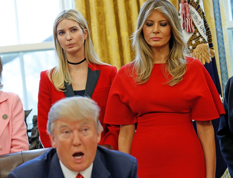 Melania and Ivanka Trump listen as the president speaks before signing H.R. 321 – a bill directing NASA to encourage women and girls to study science, technology, engineering, and mathematics, pursue careers in aerospace, and advance the nation's space science and exploration efforts – in the Oval Office on Feb. 28, 2017.