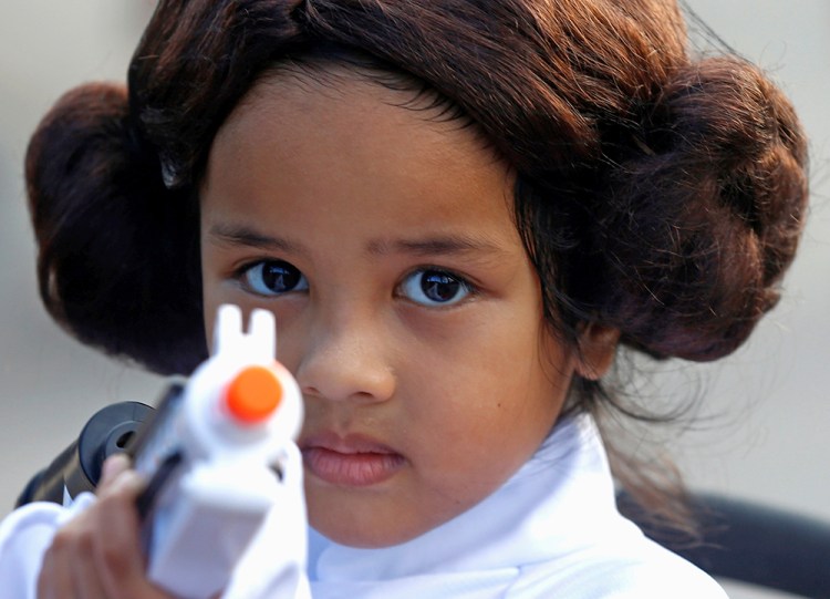 Leia Farid, 4, takes part in activities to mark Star Wars Day at Gardens by the Bay in Singapore Thursday. 