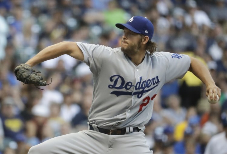 Clayton Kershaw of the Los Angeles Dodgers struck out 14 in seven innings Friday night against the Milwaukee Brewers, including the 2,000 of his career.
