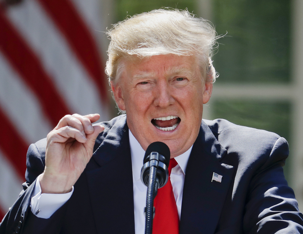 President Trump speaks about the U.S. role in the Paris climate change accord Thursday at the White House.
Associated Press/Pablo Martinez Monsivais