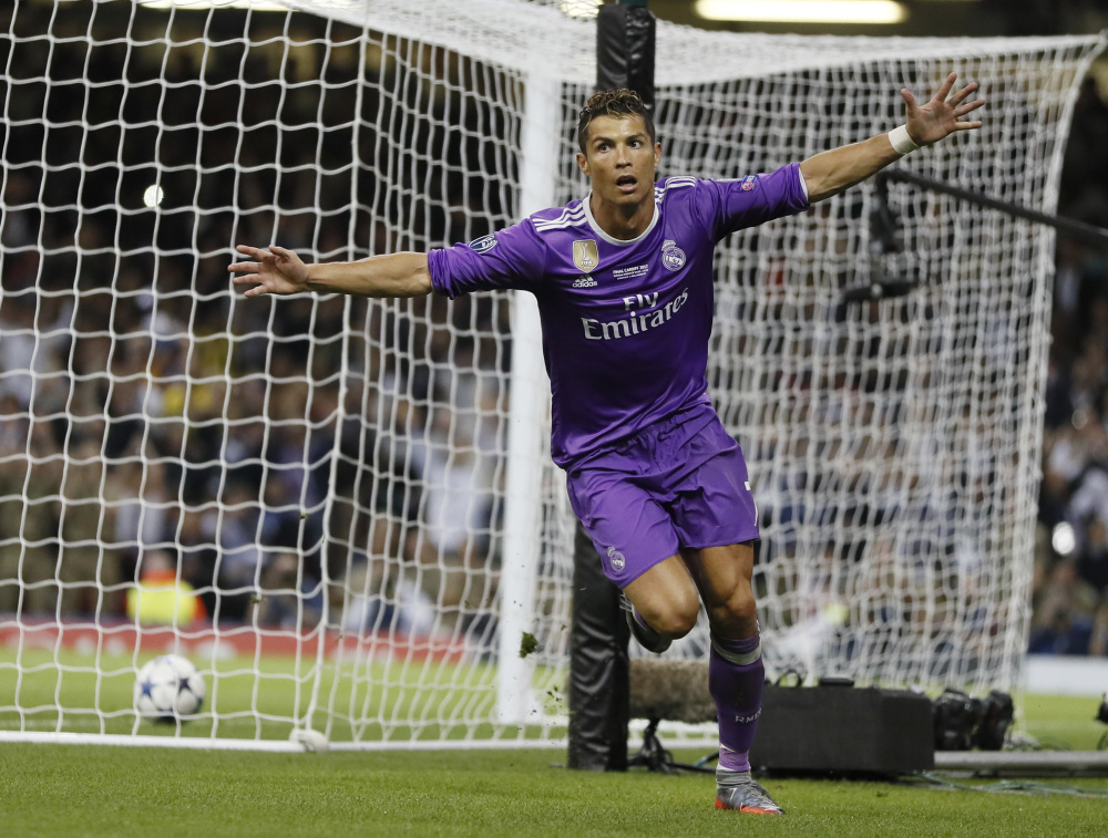 Cristiano Ronaldo of Real Madrid celebrates Saturday night after scoring during the 4-1 victory against Juventus in the Champions League final at Cardiff, Wales. Real Madrid has won a record 12 European championships.