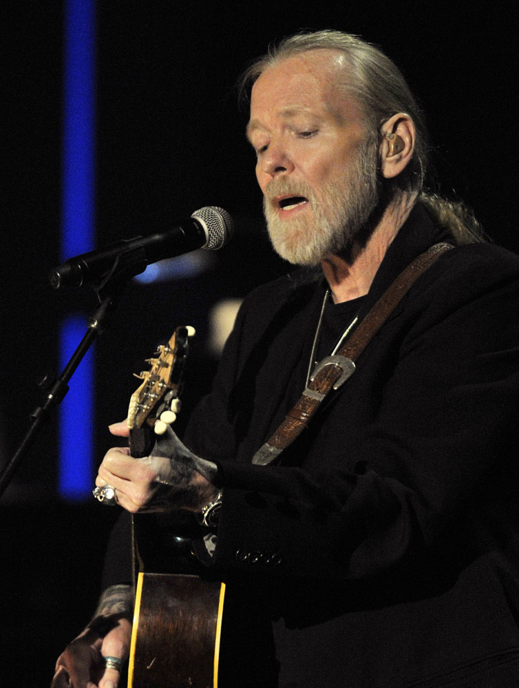 Gregg Allman plays guitar in Nashville in 2011.