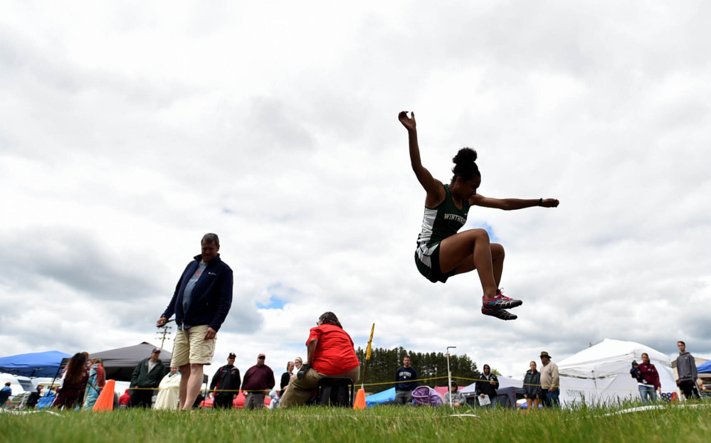 Staff photo by Michael G. Seamans
Winthrop's Aaliyah Wilson Falcone competes in the long jump during the Class C track and field state championships Saturday at Foxcroft Academy. Falcone finished sixth.