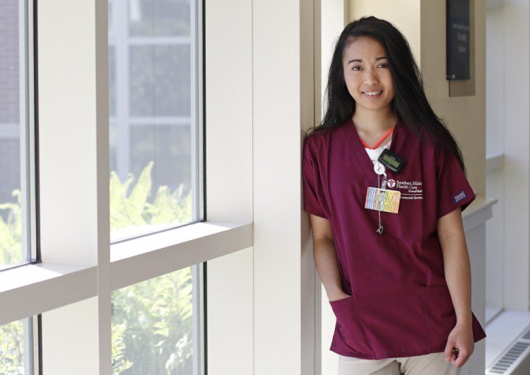 On track to become a nurse, Sheibon Claire "Bon" Tizon, 19, of Limerick, works part time at Southern Maine Health Care's hospital in Biddeford.