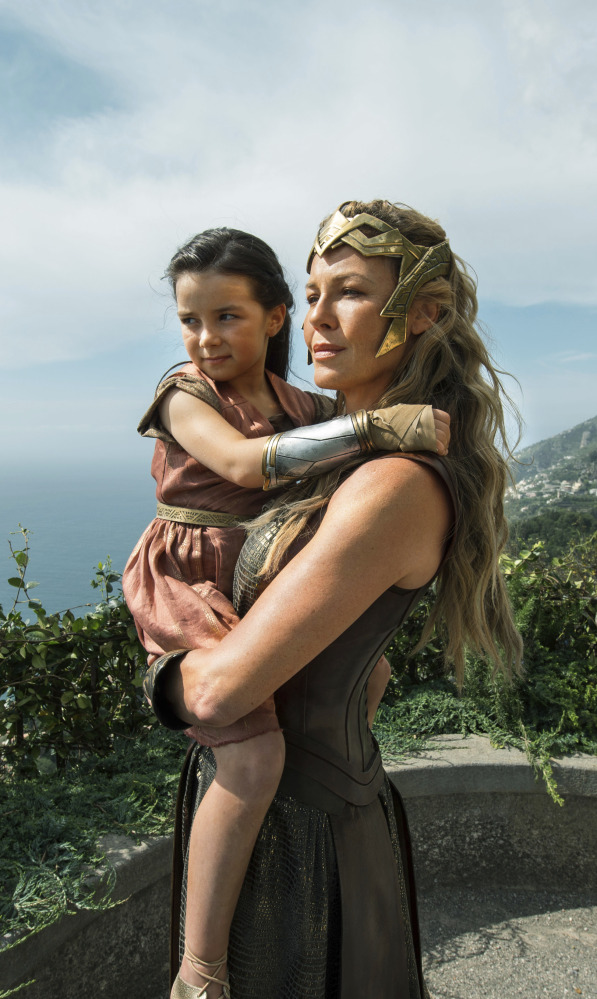 Connie Nielsen and Lilly Aspell appear in a scene from "Wonder Woman," which debuted atop the box office charts.