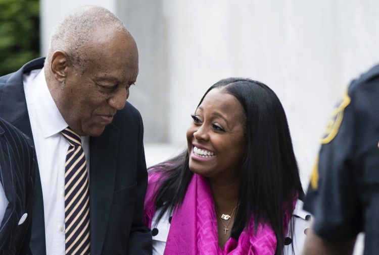 Bill Cosby arrives for his sexual assault trial with actress Keshia Knight Pulliam, right, at the Montgomery County Courthouse in Norristown, Pa., Monday. Pulliam played Cosby's youngest daughter, Rudy Huxtable, on "The Cosby Show."