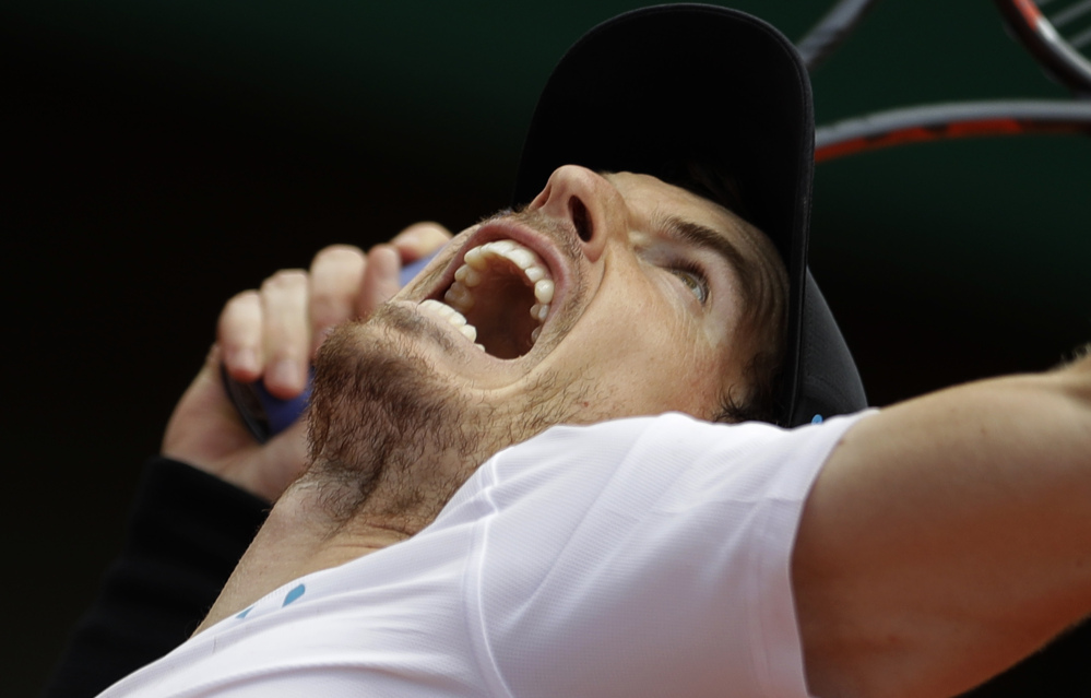 Top-seeded Andy Murray cruised into the French Open quarterfinals with a 6-3, 6-4, 6-4 win Monday over Karen Khachanov. Seven of the top eight men's seeds advanced to the quarterfinals.