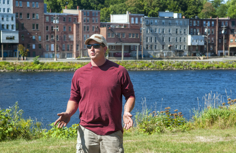 Sean Scanlon of Dresden answers questions on Sept. 17 about how he saved a child the previous evening in the Kennebec River at Augusta's East Side Boat Landing.
