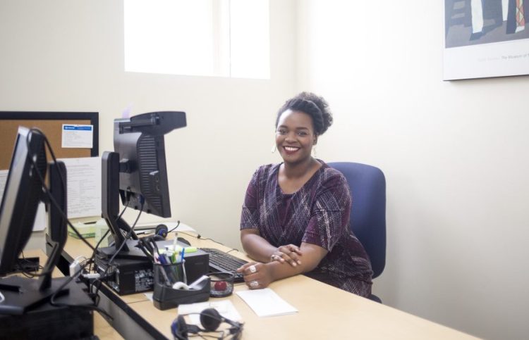 In exchange for General Assistance, Joanna Nganda translated documents for the city of Portland and manned the front desk of the city's Refugee Services Office, then used that experience to get a job at Greater Portland Health. "I don't think I would have been able to get this job" without the work history and local references gained through workfare, she says.