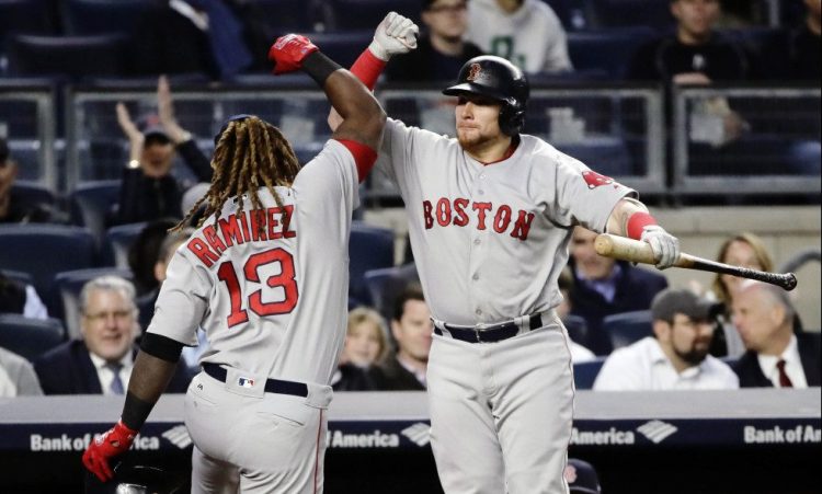 Boston Red Sox's Hanley Ramirez, 13, celebrates with Christian Vazquez after hitting a home run during the fourth inning Tuesday in New York. 