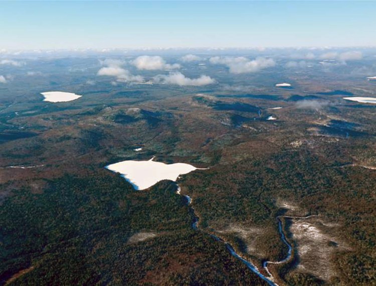 Maine lawmakers have been debating mining regulations for more than five years, ever since New Brunswick-based J.D. Irving Ltd. sought changes that would allow it to mine for gold, silver and other valuable metals near Aroostook County's Bald Mountain, shown here with Greenlaw Pond in the foreground.