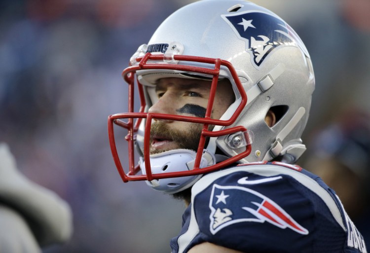 According to multiple reports, the New England Patriots have signed wide receiver Julian Edelman to a two-year contract extension. Last season, Edelman had 98 catches for 1,106 yards. (Associated Press/Elise Amendola)