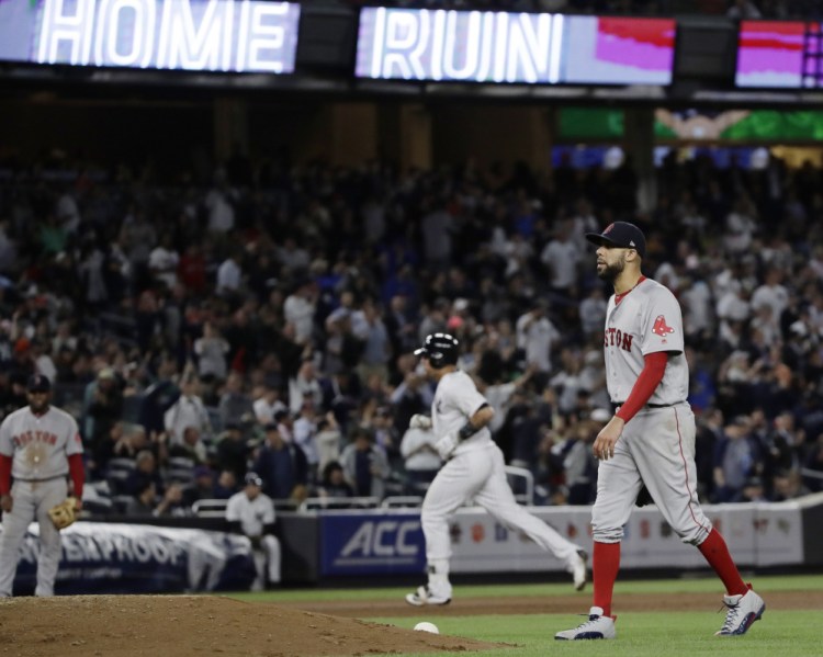 Boston's David Price walks near the mound as New York's Gary Sanchez trots around the bases after hitting a two-run home run in the fifth inning Thursday night in New York. It was Sanchez's second homer of the game.