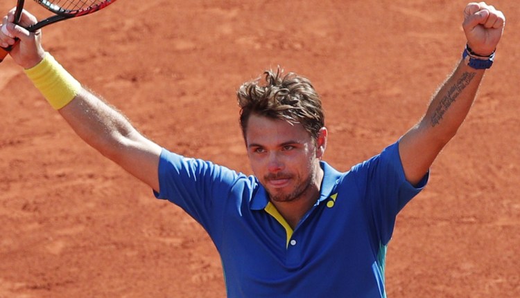 Stan Wawrinka celebrates after beating Andy Murray 6-7 (6), 6-3, 5-7, 7-6 (3), 6-1 in the semifinals of the French Open on Friday at Roland Garros stadium in Paris. Wawrinka will face Rafael Nadal in the final.