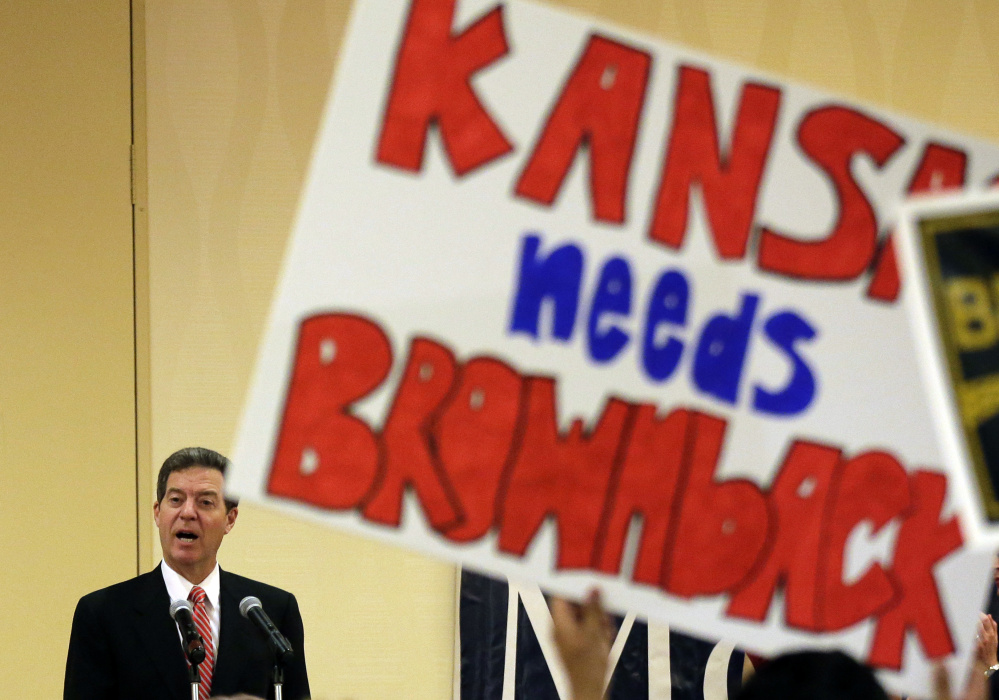 In 2014, Kansas Gov. Sam Brownback was riding a wave of popularity as the state's conservative voters gave him a mandate to embark on an unprecedented tax-cutting plan.