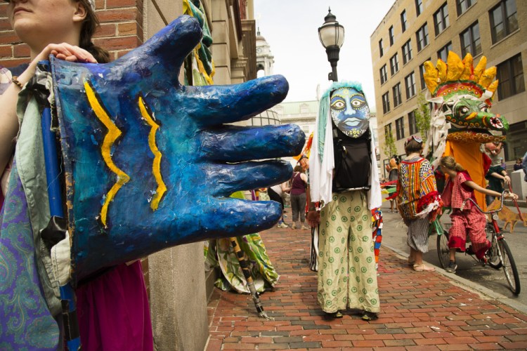 In this 2017 photo, Old Port Festival characters wait for the start of the parade on Exchange Street.