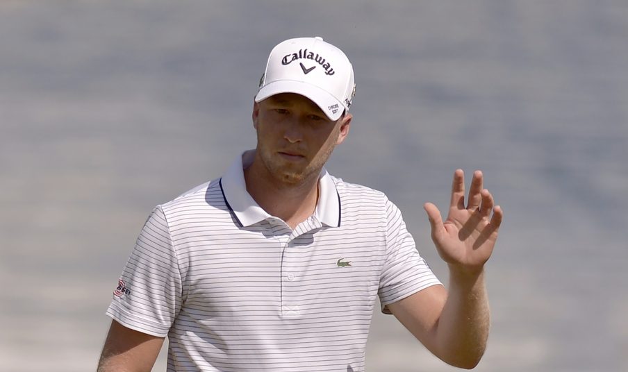 Daniel Berger waves to fans on the 18th hole during the final round of the St. Jude Classic on Sunday in Memphis, Tenn. Berger became the event's fourth back-to-back winner.