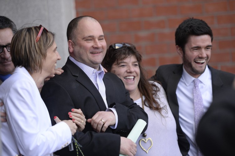 Anthony Sanborn Jr. celebrates with his family, friends and attorneys after leaving the Cumberland County Jail on bail April 13.