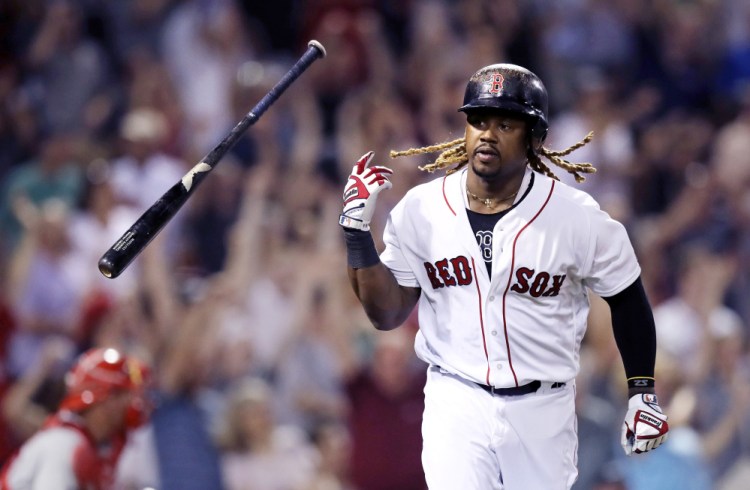 Hanley Ramirez tosses his bat after his game-tying solo home run for the Red Sox in the eighth inning of a game that Boston trailed 4-0 after one inning.