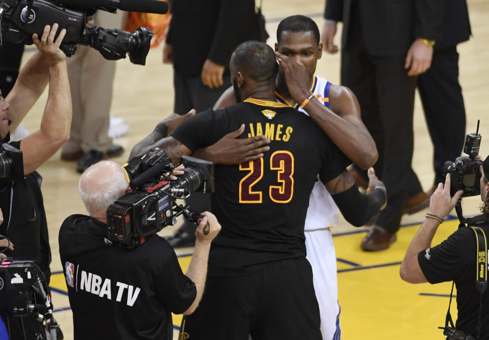 LeBron James hugged Kevin Durant after the NBA finals Monday night but make no mistake. He wants another shot at the star-laden Golden State Warriors. The question is how his Cleveland Cavaliers can reassemble a team that would pose a definite threat.
