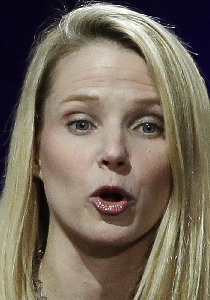 FILE - In this Feb. 19, 2015, file photo, Yahoo President and CEO Marissa Mayer delivers the keynote address at the first-ever Yahoo Mobile Developer's Conference, in San Francisco. On Tuesday, June 13, 2017, Verizon took over Yahoo, completing a $4.5 billion deal that will usher in a new management team to attempt to wring more advertising revenue from one of the internet's best-known brands. Tuesday's closure of the sale ends Yahoo's 21-year history as a publicly traded company. It also ends the nearly five-year reign of Yahoo CEO Marissa Mayer, who isn't joining Verizon. (AP Photo/Eric Risberg, File)