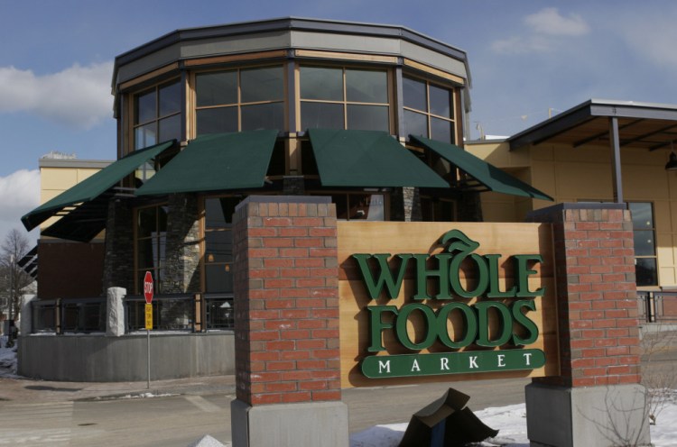 The Whole Foods Market in Portland as seen in 2007.  Online juggernaut Amazon announced Friday that it is buying Whole Foods in a deal valued at about $13.7 billion, including debt. Amazon.com Inc. will pay $42 per share of Whole Foods Market Inc.
