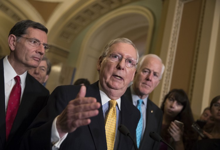 Senate Majority Leader Mitch McConnell, R-Ky., center, and Senate Republicans are writing a health care bill in secret because they know Americans won’t like the end result.