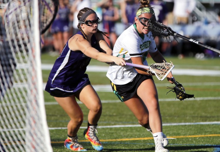 Morgan Pike, right, is one of numerous scoring threats for Massabesic, which faces Messalonskee in the Class A girls' lacrosse state final Saturday at Fitzpatrick Stadium. Messalonskee rallied for a 7-6 win in last year's matchup.