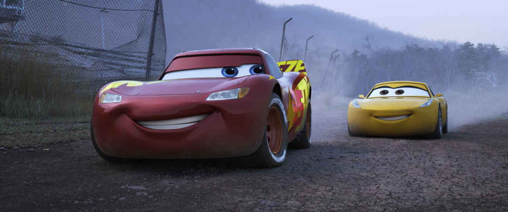 Lightning McQueen, voiced by Owen Wilson, left, and Cruz Ramirez, voiced by Cristela Alonzo, in a scene from "Cars 3."