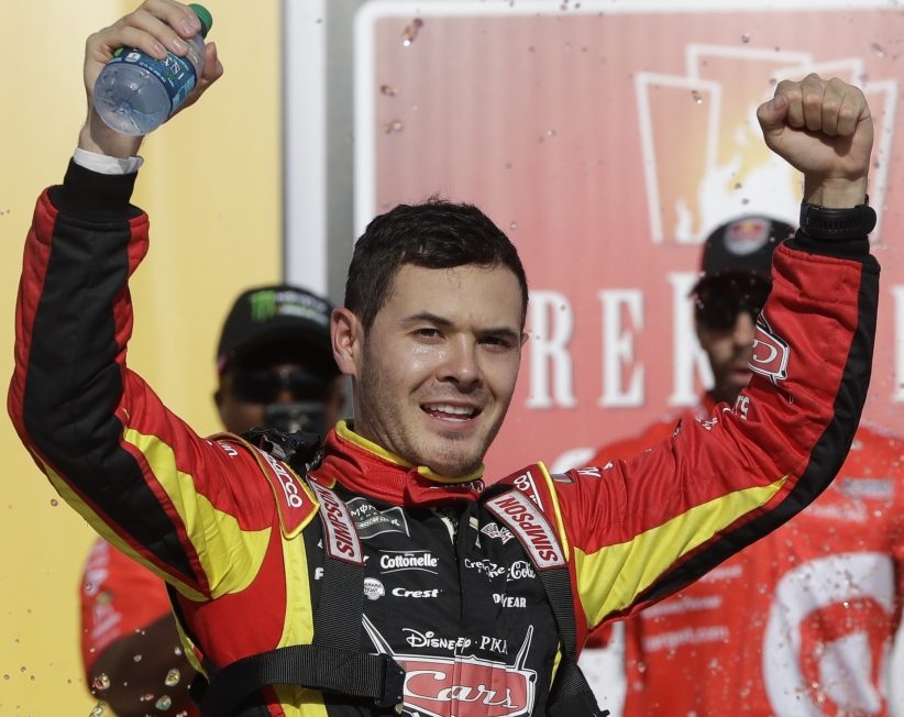 Kyle Larson celebrates his second win of the season on Sunday. It was Larson's third career win, and his second straight at Michigan.