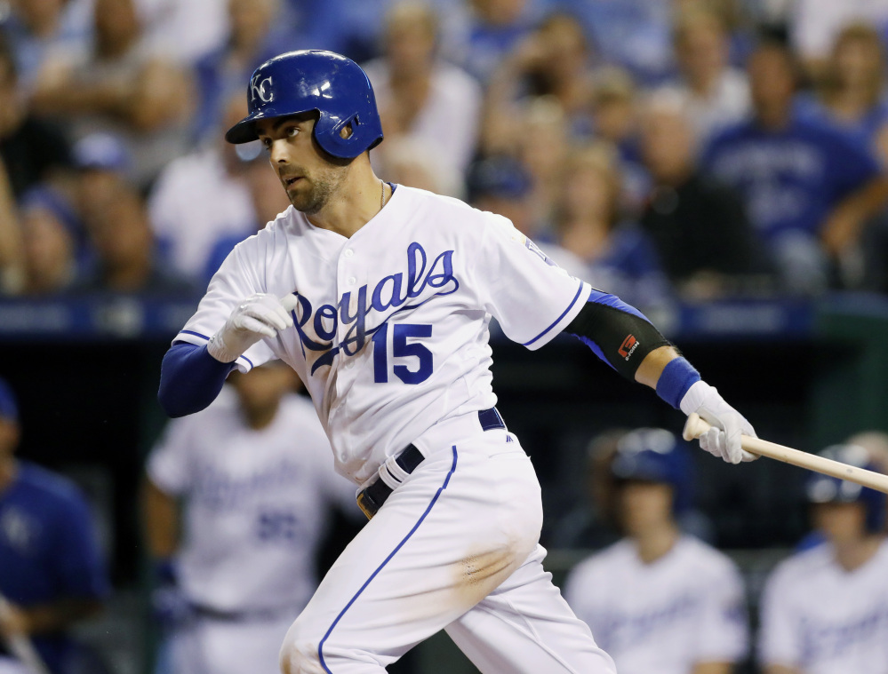 Whit Merrifield hits a single, driving in the go-ahead run against the Red Sox in the seventh inning. Kansas City held off the Red Sox in the last two innings to win.