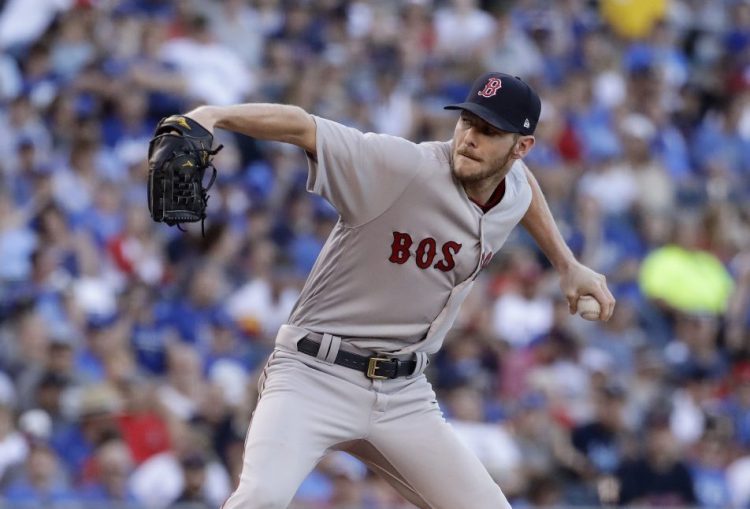 Boston Red Sox starting pitcher Chris Sale throws during the first inning Tuesday against the Kansas City Royals in Kansas City, Mo.