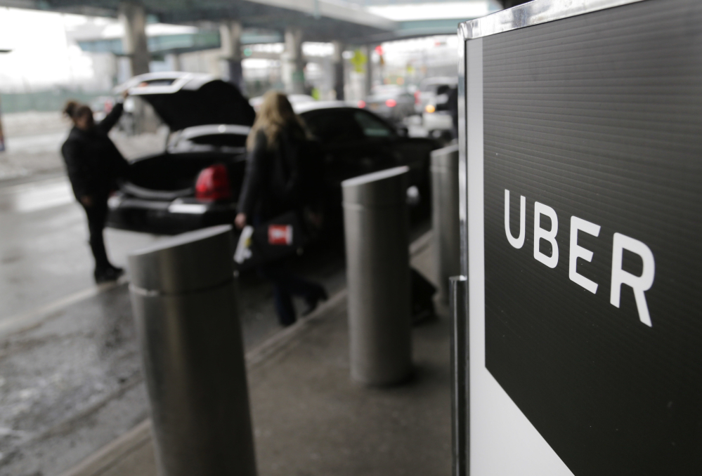 A sign marks a pick-up point at LaGuardia Airport in New York. Uber has been rocked by an unrelenting parade of controversies, including allegations of widespread sexual harassment and executive departures that culminated last week in the board announcing 47 measures aimed at overhauling the workplace.