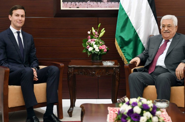 Palestinian President Mahmoud Abbas, right, meets with White House senior advisor Jared Kushner in the West Bank city of Ramallah on Wednesday.