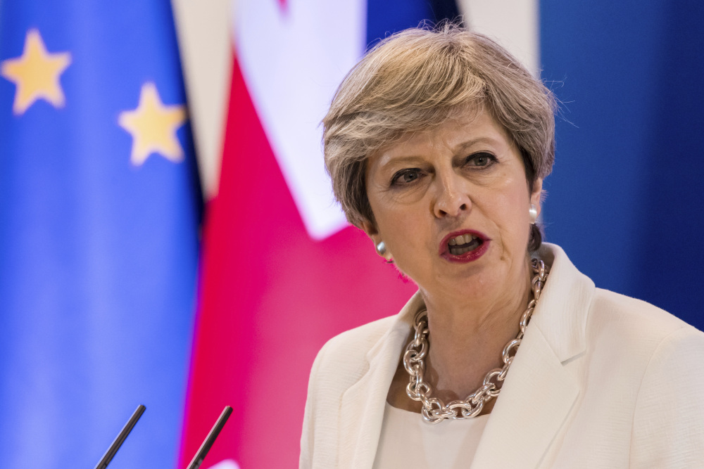 British Prime Minister Theresa May offers her post-Brexit plan for citizens' rights at an EU summit in Brussels on Friday. Many said it missed the mark.