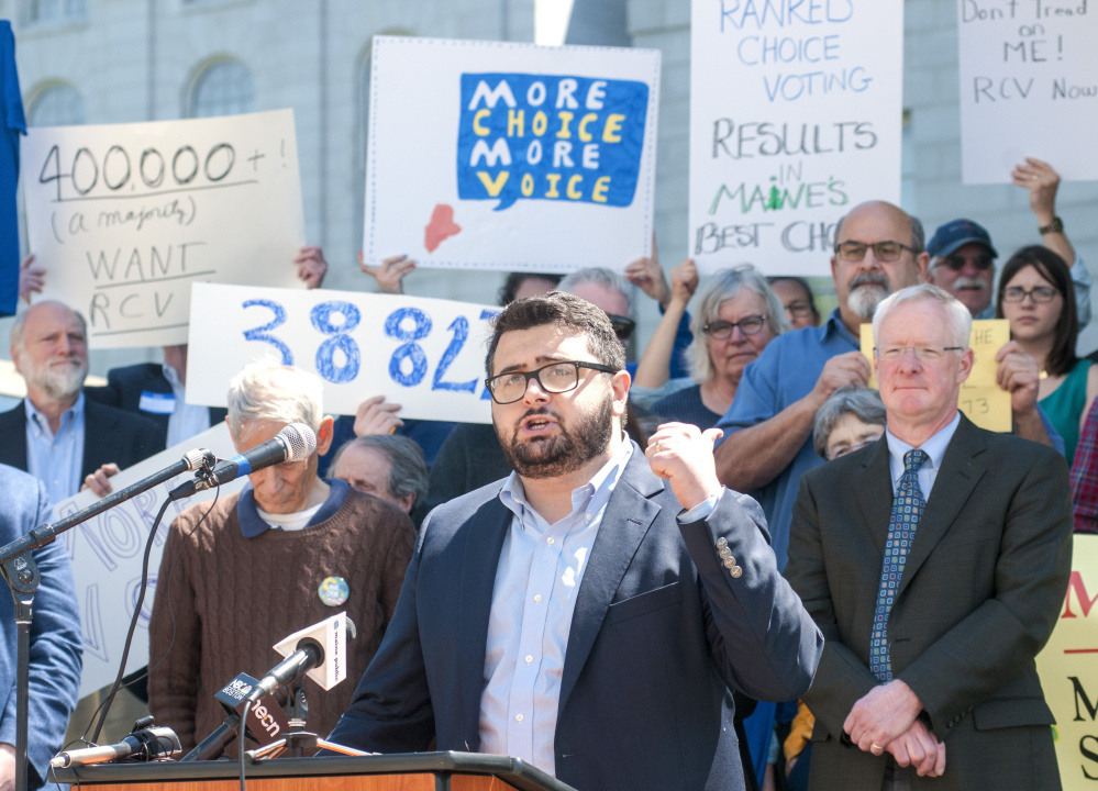 Adam Pontius, coalition coordinator for the Yes on 5 campaign, speaks at a rally to defend ranked-choice voting June 1 in Augusta. Critics have said voters were misled when they were told the new voting system was fully constitutional.