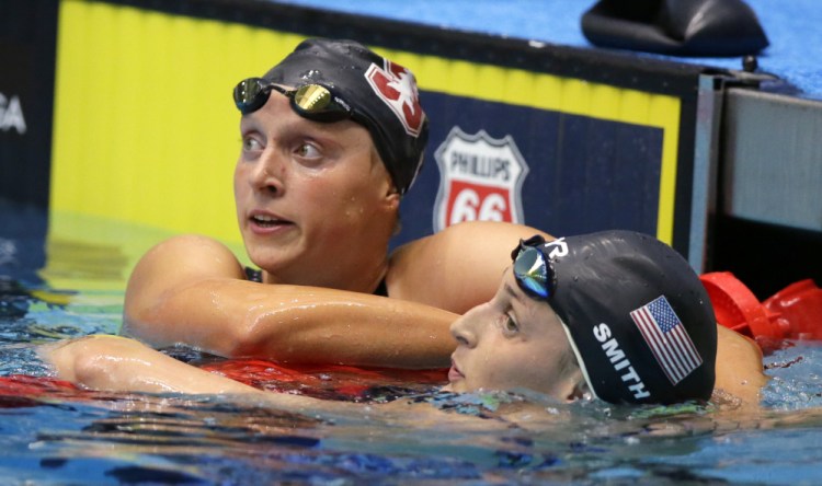 Katie Ledecky, left, celebrates with Leah Smith after winning the women's 800-meter freestyle Tuesday night at the U.S. swimming championships in Indianapolis. Smith took second.