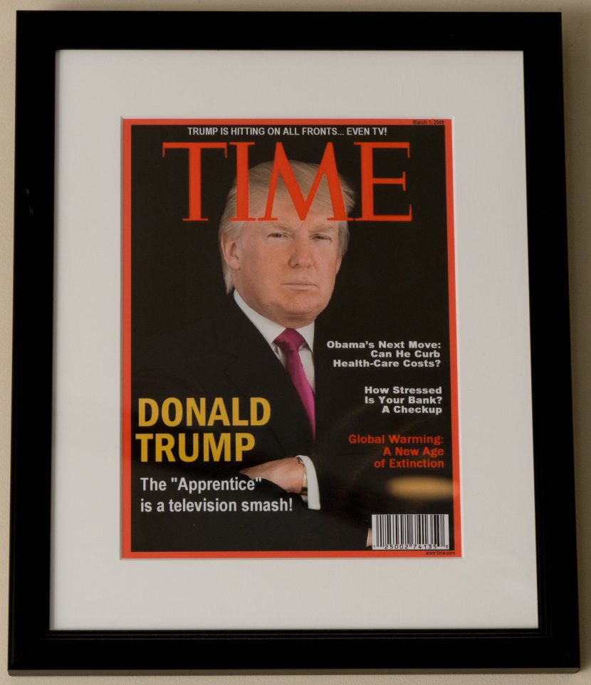 A portrait of Donald Trump graces the cover of a fake Time magazine hanging on a wall at the Trump National Doral Miami Golf Shop. The cover is dated March 1, 2009 – a date on which there was no issue of Time.