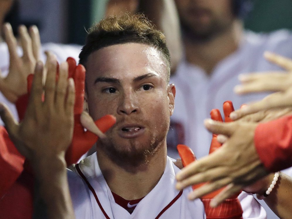 Christian Vazquez is congratulated after his two-run homer during the second inning Tuesday night at Boston.