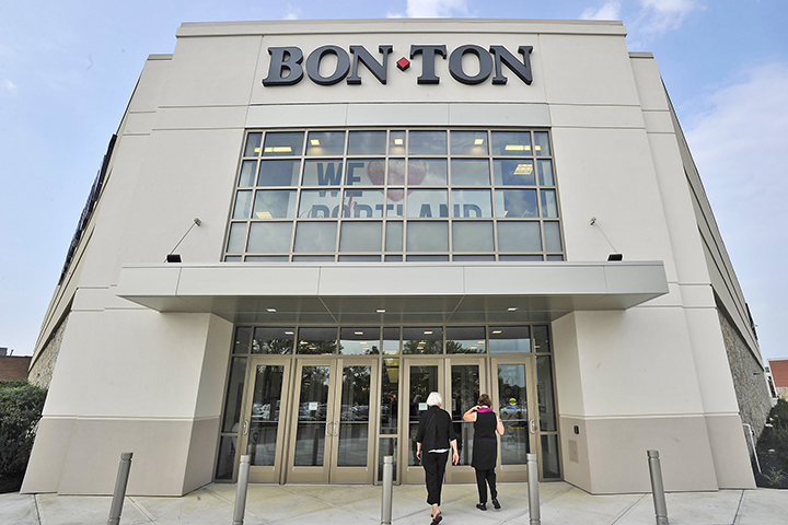 Customers head into the front entrance as Bon-Ton holds its grand opening at the Maine Mall on Sept. 12, 2013. Since then, Bon-Ton, like many retailers, has increased its online sales while its store sales have declined.