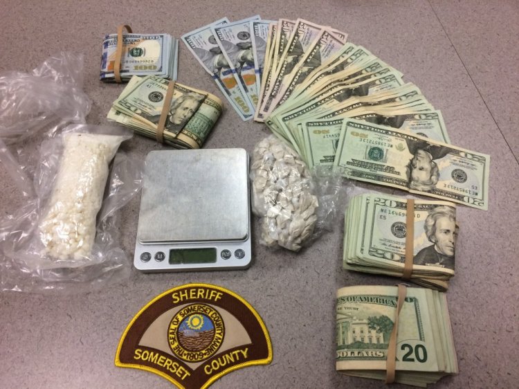 Cash and drugs allegedly seized by police Friday at 46 Summer St., apartment 3, in Skowhegan.