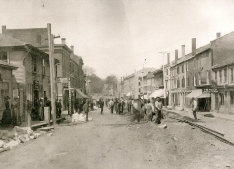 Workers build trolley tracks down the middle of Hallowell's Water Street in 1890.