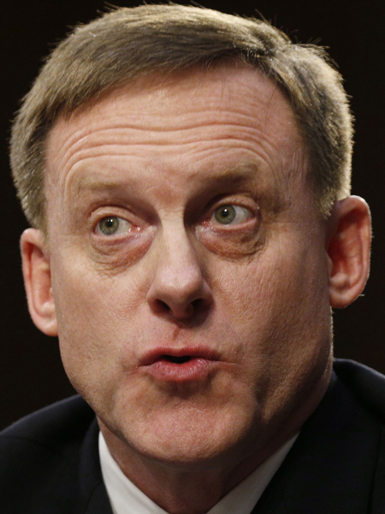 National Security Agency Director Michael Rogers testifies Wednesday before the Senate Intelligence Committee. Rogers wouldn’t answer whether he was asked by President Trump to intervene in the FBI’s investigation into Russia’s possible involvement in last year's election.
