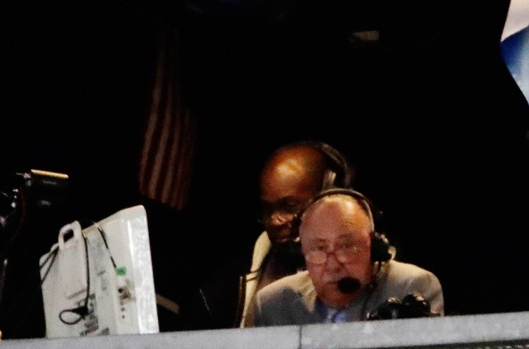 Boston Red Sox broadcaster Jerry Remy works during the seventh inning of a baseball game Tuesday between the New York Yankees and the Red Sox. Remy said pitchers such as Yankees ace Masahiro Tanaka shouldn't be allowed translators on the mound. 