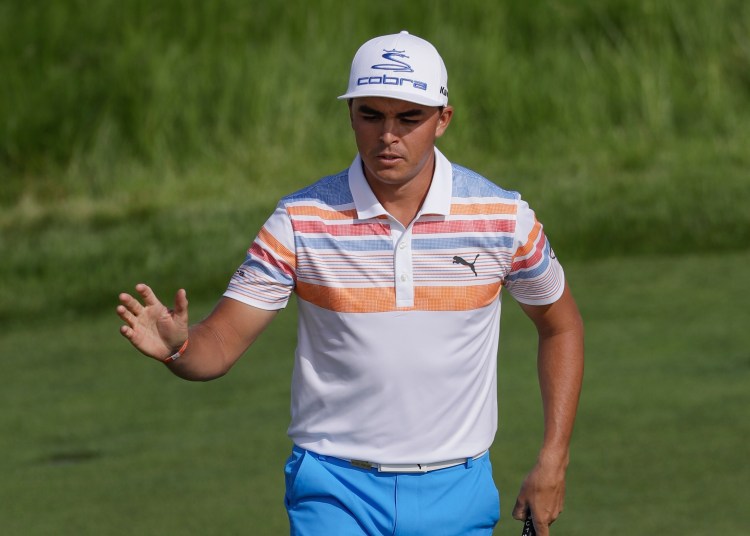 Rickie Fowler reacts after his birdie on the12th hole during the first round of the U.S. Open Thursday at Erin Hills in Erin, Wis.