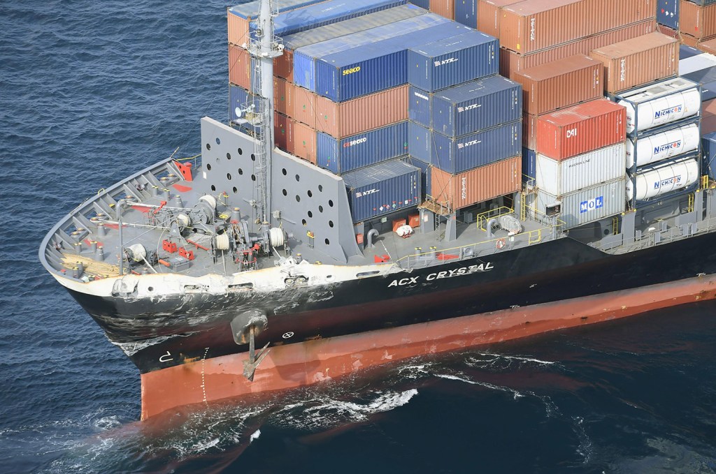 The damage to the Philippine-registered container ship ACX Crystal is seen off Izu Oshima, Japan, on Saturday.