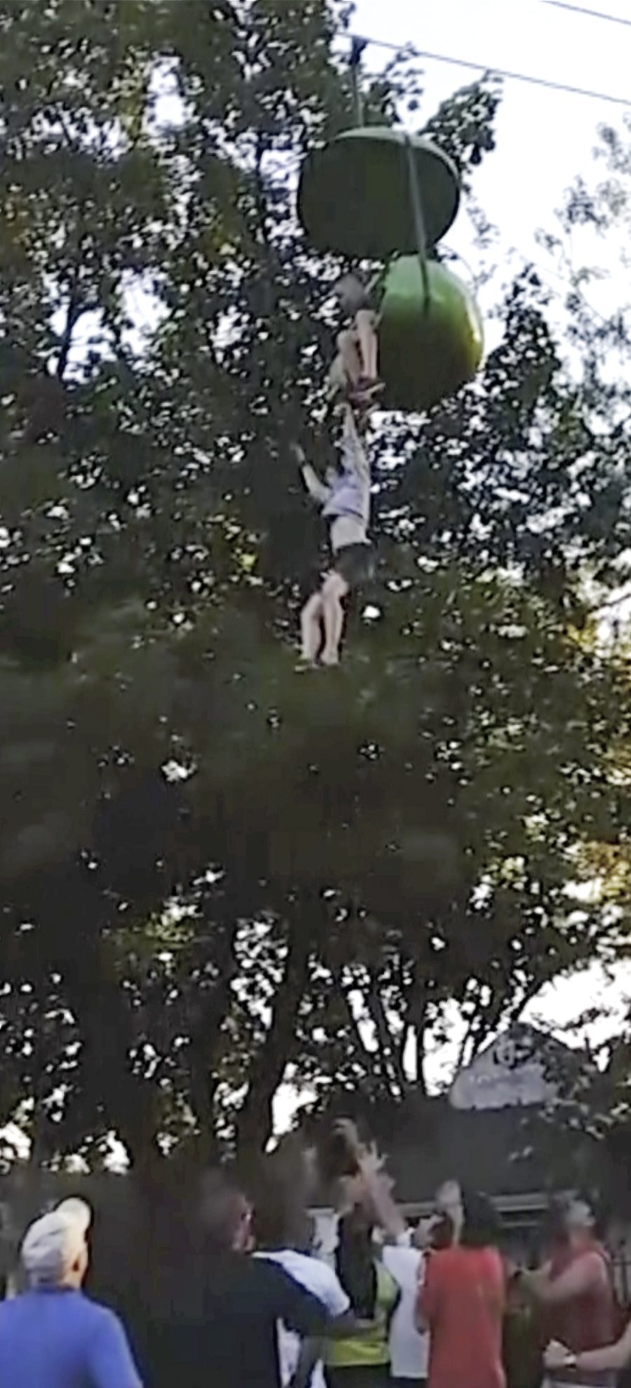 Onlookers catch teen falling from amusement park ride