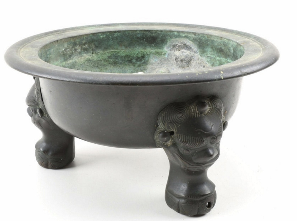 Bidding for the antique bronze Chinese footed bowl starts at a dollar.